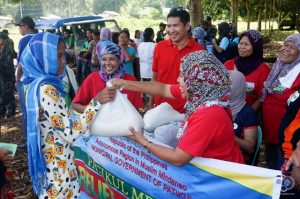 Staff from the Municipal Government of Patikul, Sulu distribute rice and other relief items to families displaced by the ongoing military operations against the Abu Sayyaf (ASG).