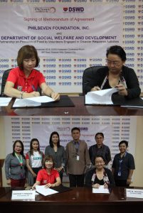 First photo -- Department of Social Welfare and Development (DSWD) Secretary Judy M. Taguiwalo (right) and PhilSeven Foundation Inc (PFI). Vice-Chairperson Liwayway Fernandez signing the Memorandum of Agreement (MOA) which institutionalizes the partnership of both organizations in disaster response. The PhilSeven has been assisting the DSWD in its disaster response through the provision of food to the volunteers who repack family food packs for immediate distribution to the disaster victims. Second photo - Sec. Taguiwalo and Ms. Fernandez are joined by (from left to right) Ms. Leizel Mangoa, PFI Administrative Officer; Ms. Israelita Ferrer-Lequin, PFI Agency Head; Ms. Violeta Apolinario, PFI Chairman; DSWD Assistant Secretary Rodolfo Santos; Mr. Claudio Nadal, Jr, Chief Adminsitrative Officer of the National Resource Operations Office; and, Ms. Mappet Balawan of DSWD-Disaster Response and Management Bureau. 