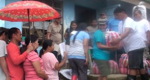 Typhoon Pablo victims from Monkayo, Compostela Valley queue up to claim their assistance.