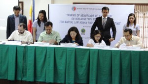 (From left) Commission on Human Rights (CHR) Chairperson Jose Luis Martin C. Gascon, Department of Health (DOH) Assistant Secretary Nestor F. Santiago Jr., CHR Chairperson Lina C. Sarmiento, Ms. Jesusa Cabilao from DSWD, and  Technical and Skills Development Authority (TESDA) Deputy Director General Atty. Teodoro C. Pascua  sign the Memorandum of Agreement (MOA) with the Human Rights Victims Claims Board (HRVCB) for the provision of programs and services for victims of human rights violations.