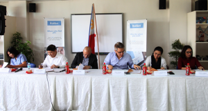 Usec. Angelita Medel (2nd from right) signs the agreement together with other partner-agencies during the signing ceremony. 