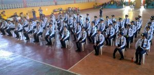 Wearing a complete set of uniform, beneficiaries of the Pantawid Pamilyang Pilipino Program (4Ps) of the Department of Social Welfare and Development (DSWD) wait for their names to be called to receive their Certificates of Completion after successfully finishing a security servicing course.