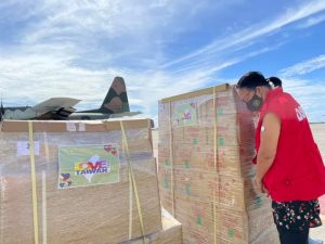 Department of Social Welfare and Development (DSWD) Region VII Director Rebecca Geamala inspects the donations provided by the Taipei Government for Typhoon Odette victims.